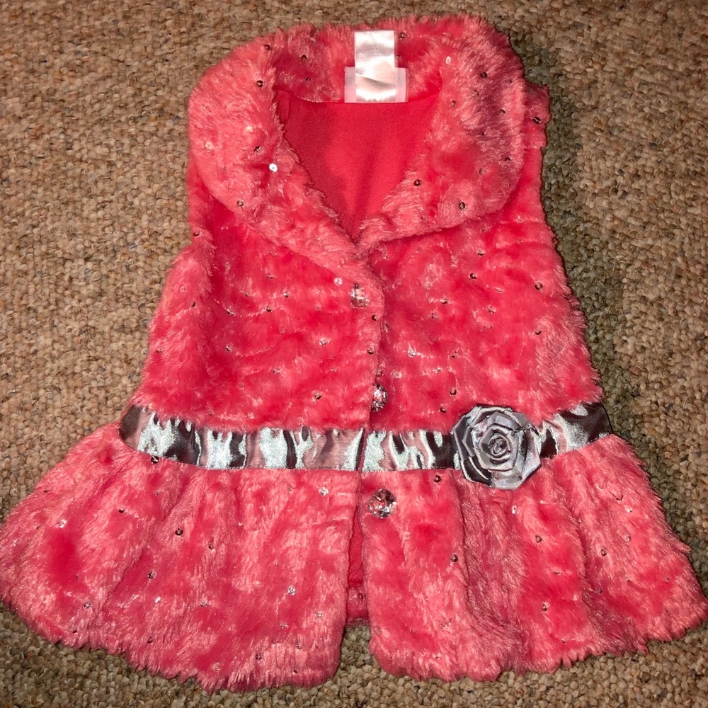 Toddler girl pink vest .